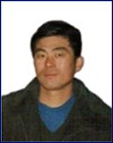 Mr. Qin Yueming prior to his detention 