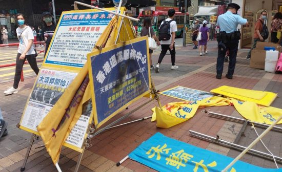 December 2020: Hong Kong booths in tatters, police called on Hu Aimin for assaulting volunteers in Hong Kong.