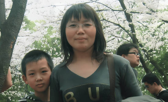 Ms. Gong Xianghui and her son.